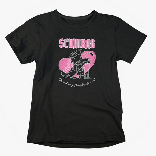 a black t - shirt with a pink heart on it