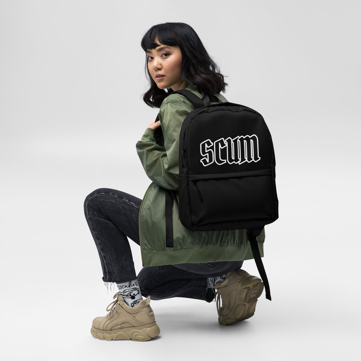 The SCUM Backpack - all-over print streetwear backpack with laptop pocket, front view