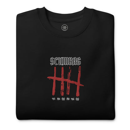 a black t - shirt with the words scumbag on it