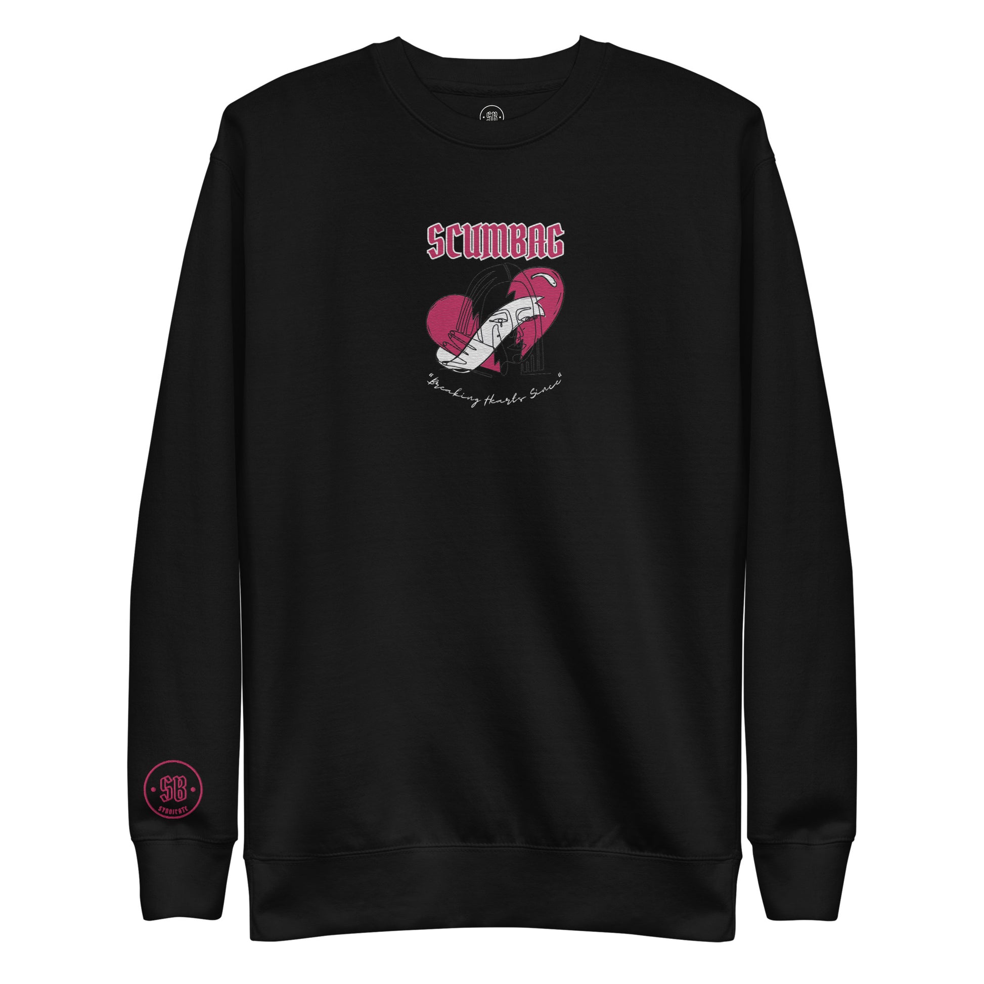 a black sweatshirt with a pink heart on it